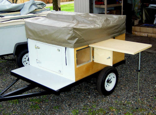 Compact Camping Concepts Roof Top Tent and Trailer Sidetable